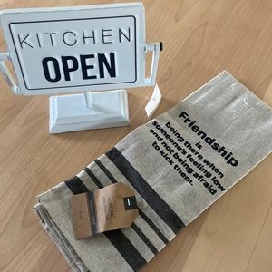 New with tags Kitchen decor. Kitchen towel and sign. Sold together.